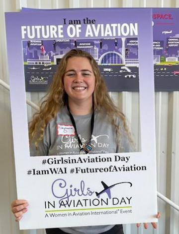 Selfie with 'I am the future of aviation' sign
