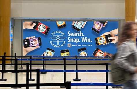 Airport display. Search. Snap. Win. The GRReat Billboard Hunt